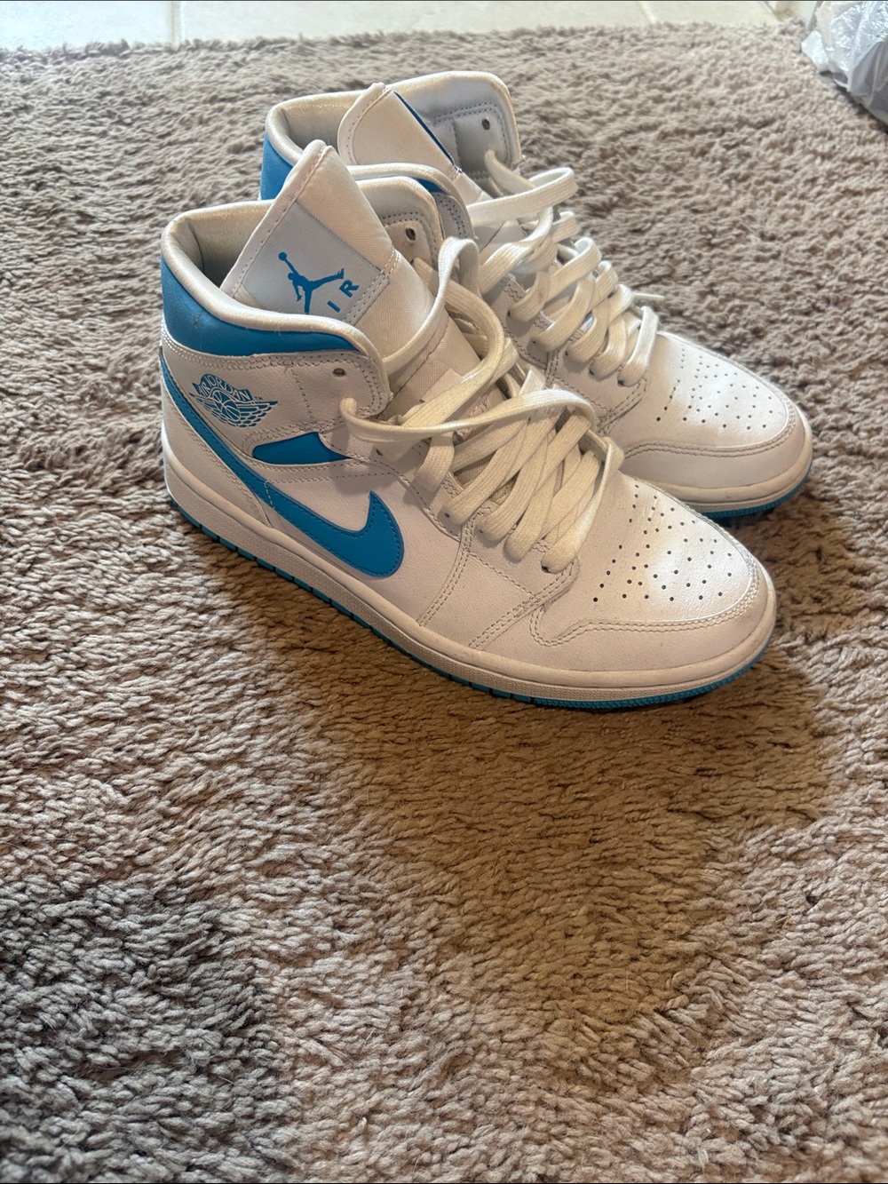 Nike Air Jordan 1 Mid White and University Blue Sneakers